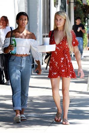 Demi Burnett braless boobs in a low cut dress showing nice cleavage seen by paparazzi.






