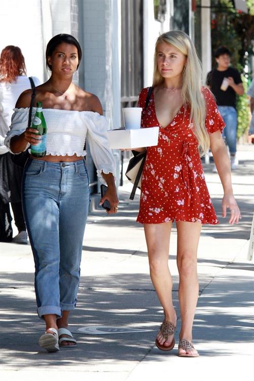 Demi Burnett braless boobs in a low cut dress showing nice cleavage seen by paparazzi.






