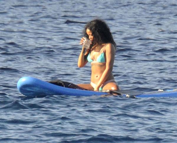 Rihanna paddle boarding