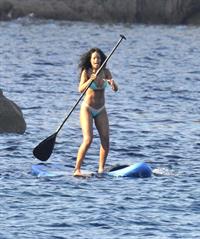 Rihanna paddle boarding
