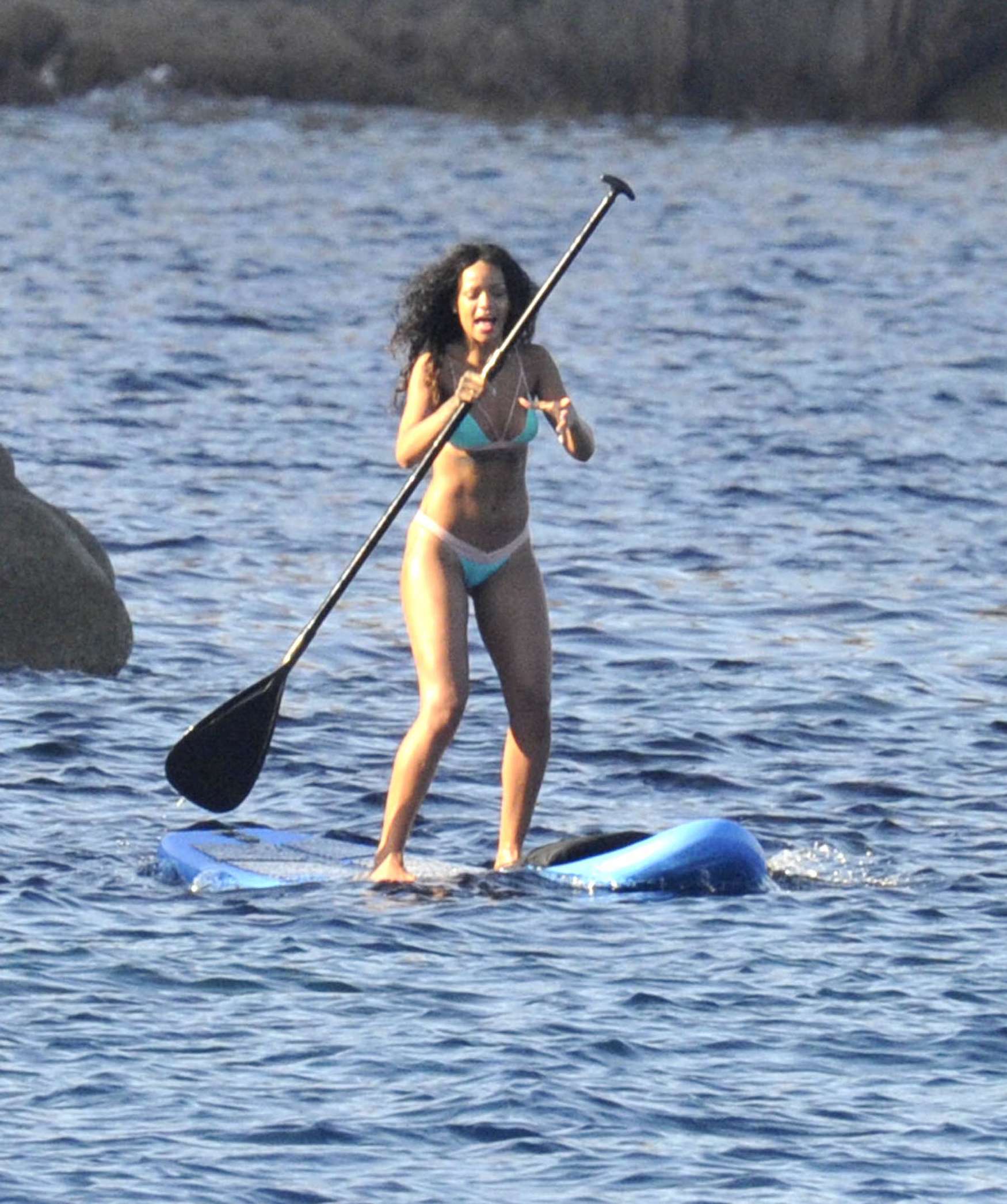 Rihanna paddle boarding