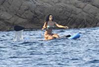 Rihanna paddle boarding