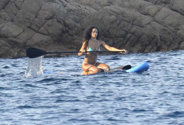 Rihanna paddle boarding
