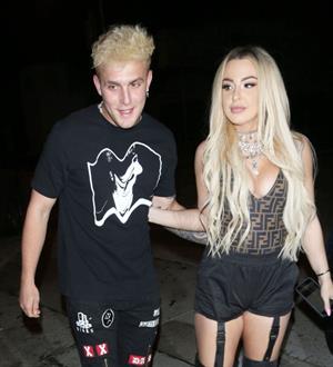 Tana Mongeau sexy cleavage in a revealing little outfit with Jake Paul.











