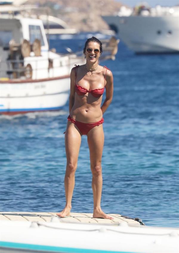 Alessandra Ambrosio perfect model body in a sexy little thong bikini seen at the beach by paparazzi showing nice cleavage and ass.





















