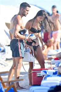 Ambra Gutierrez sexy ass and cleavage in a bikini at the beach seen by paparazzi.





































