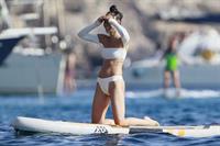 Cara Santana sexy ass in a thong bikini seen by paparazzi with Jesse Metcalfe.












































