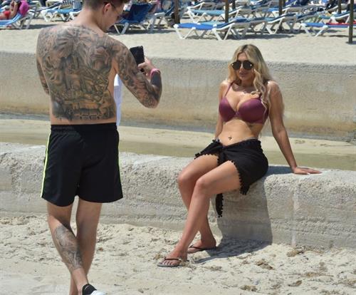 Chloe Ferry Bikini Pictures Chloe Ferry big boobs showing nice cleavage seen by paparazzi in a sexy bikini.