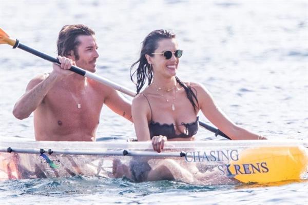 Alessandra Ambrosio sexy at the beach in a thong bikini and flashing her pussy to her boyfriend seen by paparazzi.











