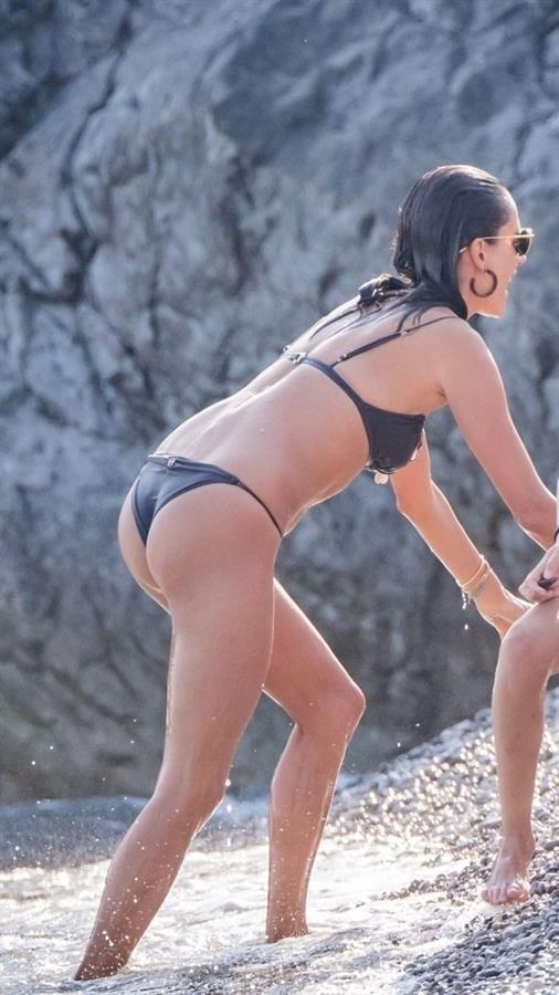 Alessandra Ambrosio sexy at the beach in a thong bikini and flashing her pussy to her boyfriend seen by paparazzi.











