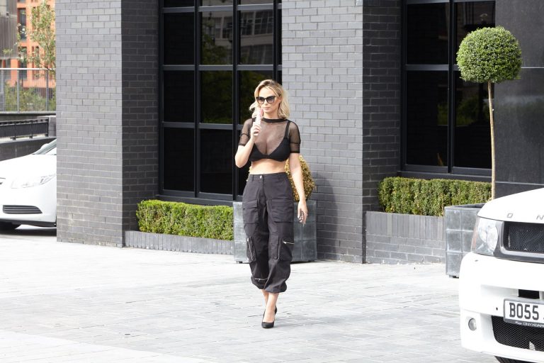 Rhian Sugden Pictures Rhian Sugden big boobs showing nice cleavage seen by paparazzi.