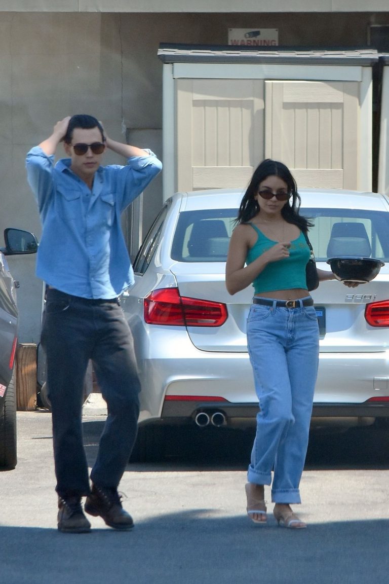 Vanessa Hudgens Pictures Vanessa Hudgens braless nipples pokies in a green top showing off her tits seen by paparazzi with Austin Butler.