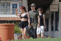 Ariel Winter paparazzi pictures in black bikini top and short skirt