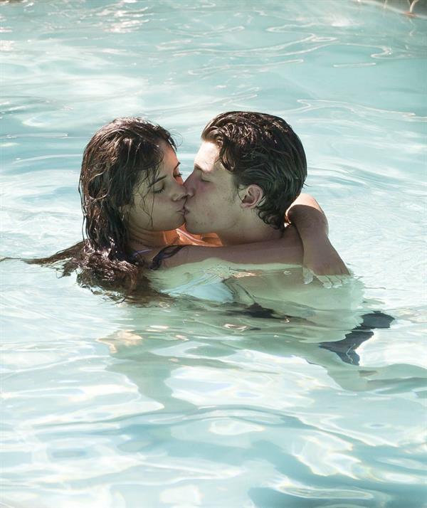 Camila Cabello and Shawn Mendes making out in the water seen kissing by paparazzi.






































