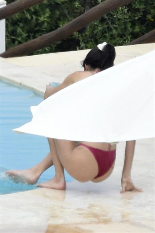 Kendall Jenner with Kourtney Kardashian sexy asses in thong bikinis seen by paparazzi.

