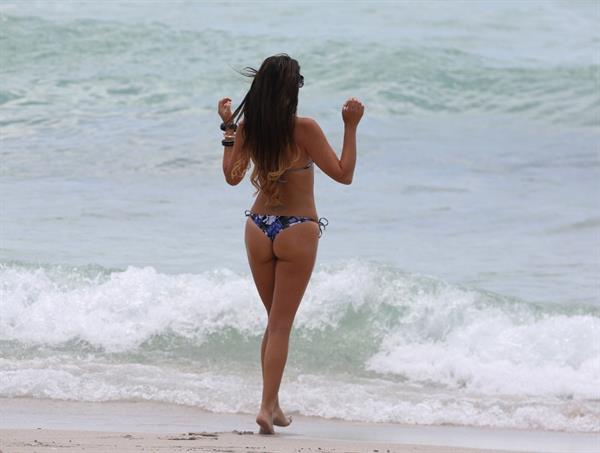 Claudia Romani in a bikini - ass