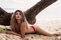 Nikki Trinidad takes off her red bikini for Playboy