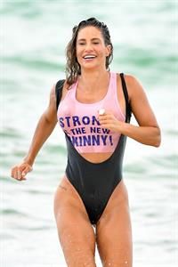 Jennifer Nicole Lee sexy big boobs in a wet see through swimsuit seen by paparazzi at the beach.

