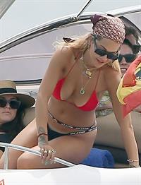 Rita Ora sexy ass in a thong bikini seen by paparazzi.
