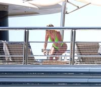 Stassie Karanikolaou sexy ass in a green thong bikini showing nice cleavage with her big boobs seen by paparazzi.








