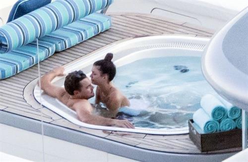 Camila Morrone Bikini Pictures Camila Morrone in a sexy swimsuit in a hot tub on a yacht with Leonardo DiCaprio seen by paparazzi.