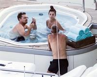 Camila Morrone in a sexy swimsuit in a hot tub on a yacht with Leonardo DiCaprio seen by paparazzi.










