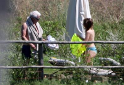 Alejandra Silva caught topless with her nude boobs exposed by paparazzi on vacation.
