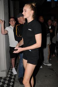Sophie Turner braless boobs in a black shirt seen by paparazzi showing her tits and her pierced nipple.





