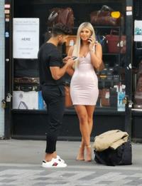 Belle Hassan wardrobe malfunction as the ass of her dress rips she had to call someone to sew it seen by paparazzi.




