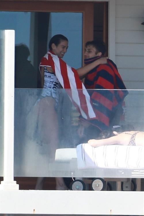 Dua Lipa sexy ass and cleavage in a swimsuit at the beach seen with her boyfriend by paparazzi.













