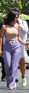 Kourtney Kardashian braless boobs in a nude tank top showing off her tits pokies with Kris Jenner seen by paparazzi.














