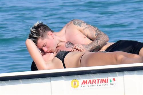 Bella Thorne Bikini Pictures Bella Thorne making out and having fun with her boyfriend in a sexy little bikini seen by paparazzi.