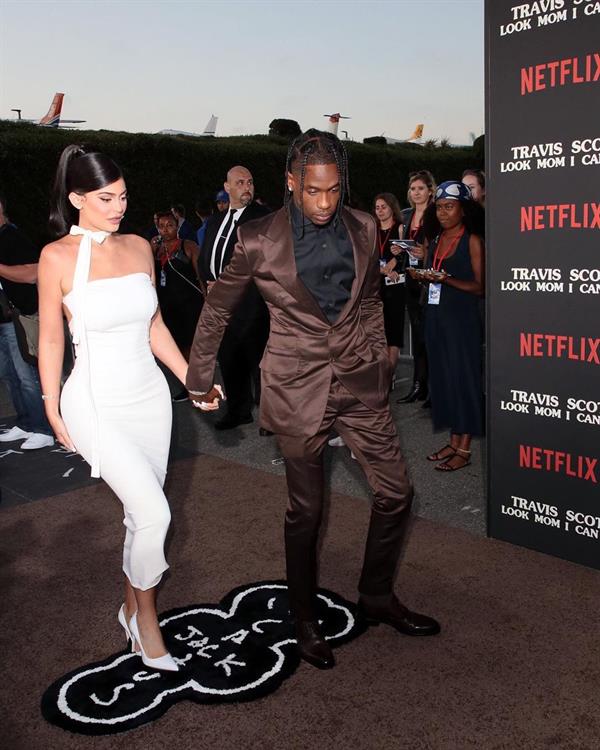 Kylie Jenner sexy ass in a tight white dress with Travis Scott at the premiere of  Look Mom I Can Fly .





































