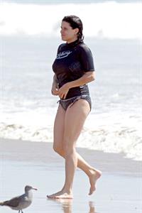 Neve Campbell in a bikini