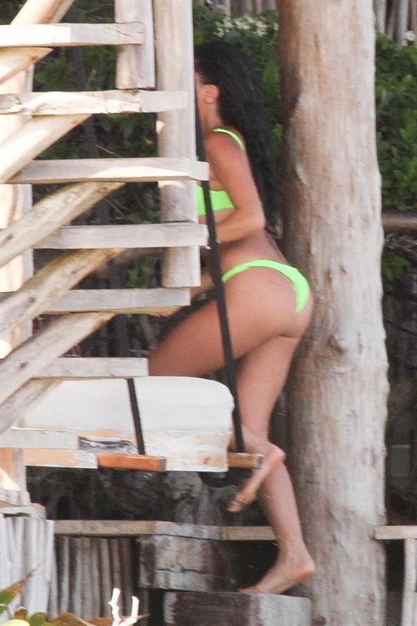 Vanessa Morgan in a tight green bikini showing nice cleavage and her sexy ass seen by paparazzi.




















