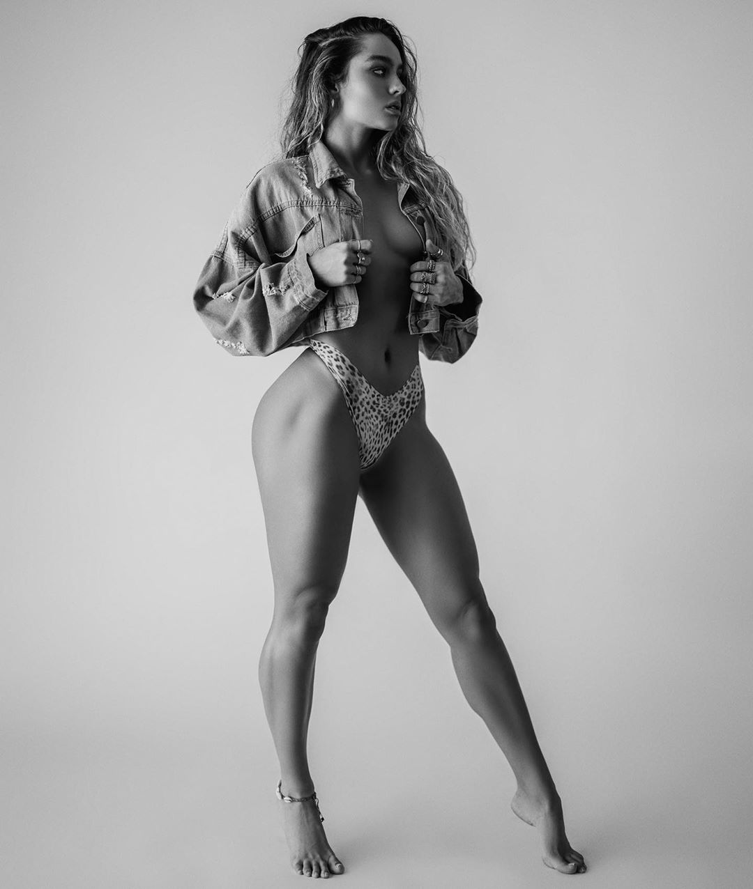 Sommer Ray topless photo shoot in just a jacket showing nice cleavage from  her nude boobs. Unrated