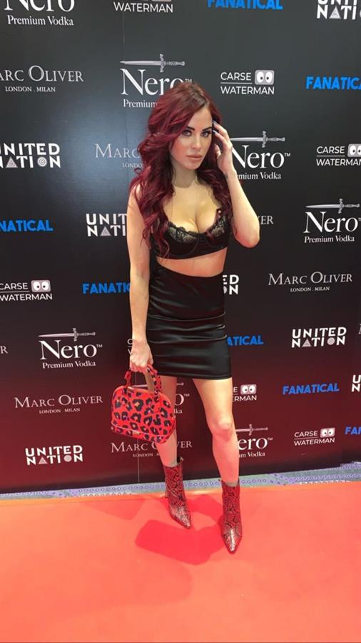 Carla Howe nip slip wardrobe malfunction seen by paparazzi flashing her tits on the red carpet for Fanatical film premiere.



















