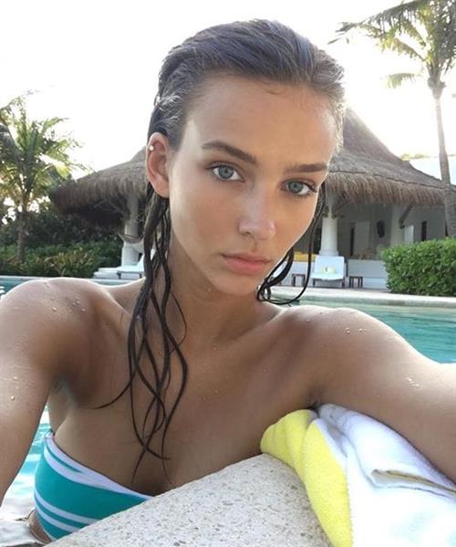 Rachel Cook in a bikini taking a selfie