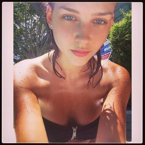 Rachel Cook in a bikini taking a selfie