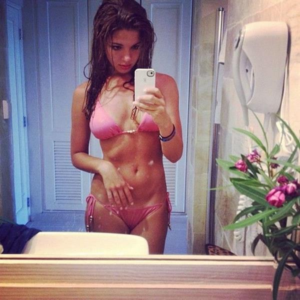 Jessica Ashley in a bikini taking a selfie