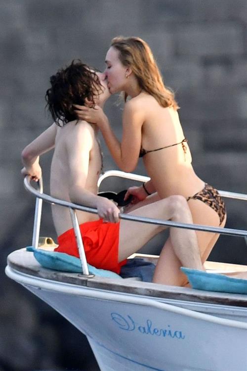 Lily-Rose Depp Bikini Pictures Lily-Rose Depp sexy ass in a little thong bikini making out with Timothee Chalamet on a boat seen by paparazzi.