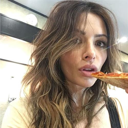 Sarah Shahi taking a selfie