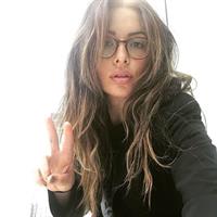 Sarah Shahi taking a selfie