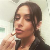 Sarah Shahi taking a selfie
