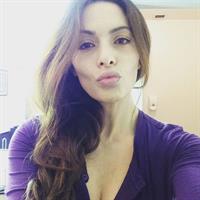 Sarah Shahi taking a selfie