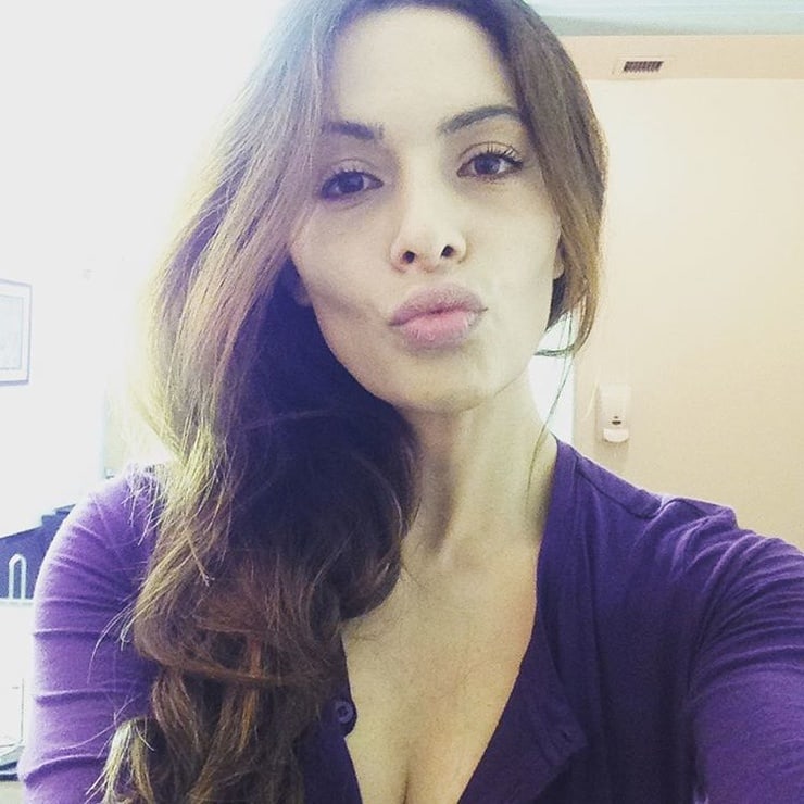 Sarah Shahi taking a selfie