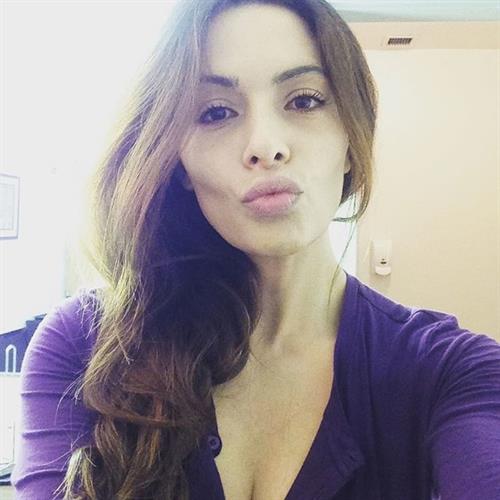 Sarah Shahi taking a selfie