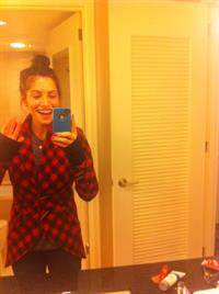 Sarah Shahi taking a selfie