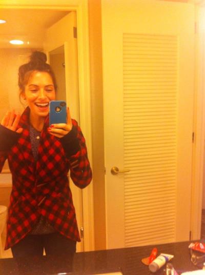 Sarah Shahi taking a selfie