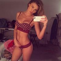 Simone Villas Boas in lingerie taking a selfie